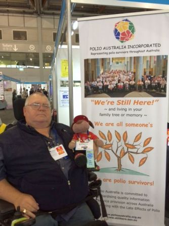 George Laszuk mans Polio Australia Stand - Rotary International Convention, Sydney