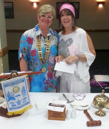 Sue MacKenzie (right) with Denise Mitchell, President of the Mulgrave Rotary Club, Cairns
